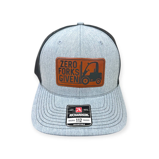 Front view of Zero Forks Given patch hat by Horizon Hat Co. in heather gray/black showing forklift illustration and workplace-humor lettering