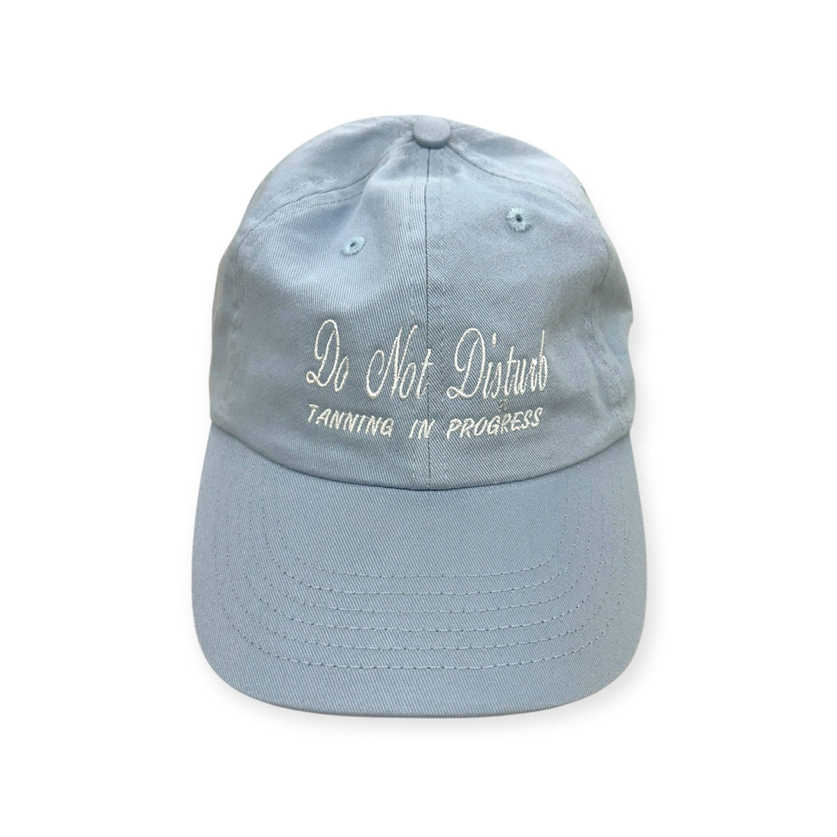 Front view of Do Not Disturb, Tanning in Progress embroidered cap by Horizon Hat Co. in blue showing do not disturb, tanning in progress front embroidery