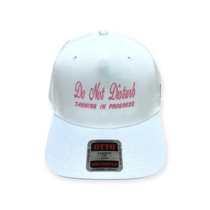 Front view of Do Not Disturb, Tanning in Progress embroidered cap by Horizon Hat Co. in white showing do not disturb, tanning in progress front embroidery