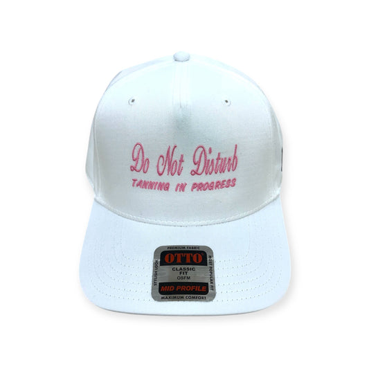 Front view of Do Not Disturb, Tanning in Progress embroidered cap by Horizon Hat Co. in white showing do not disturb, tanning in progress front embroidery