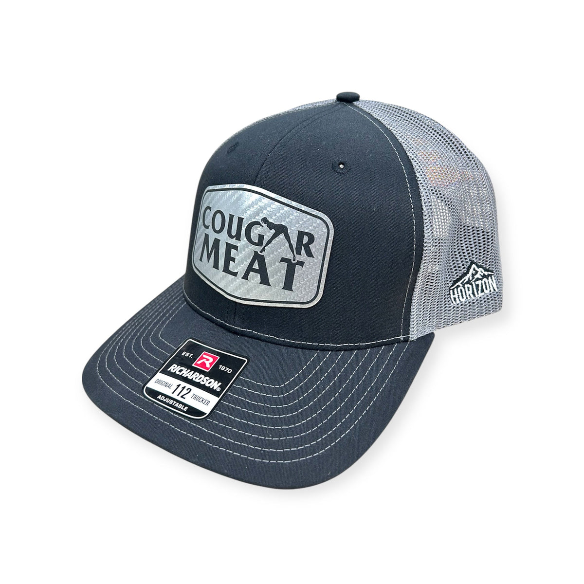 Angled view of Cougar Meat patch hat by Horizon Hat Co. in black/gray showing the curved bill and side panels