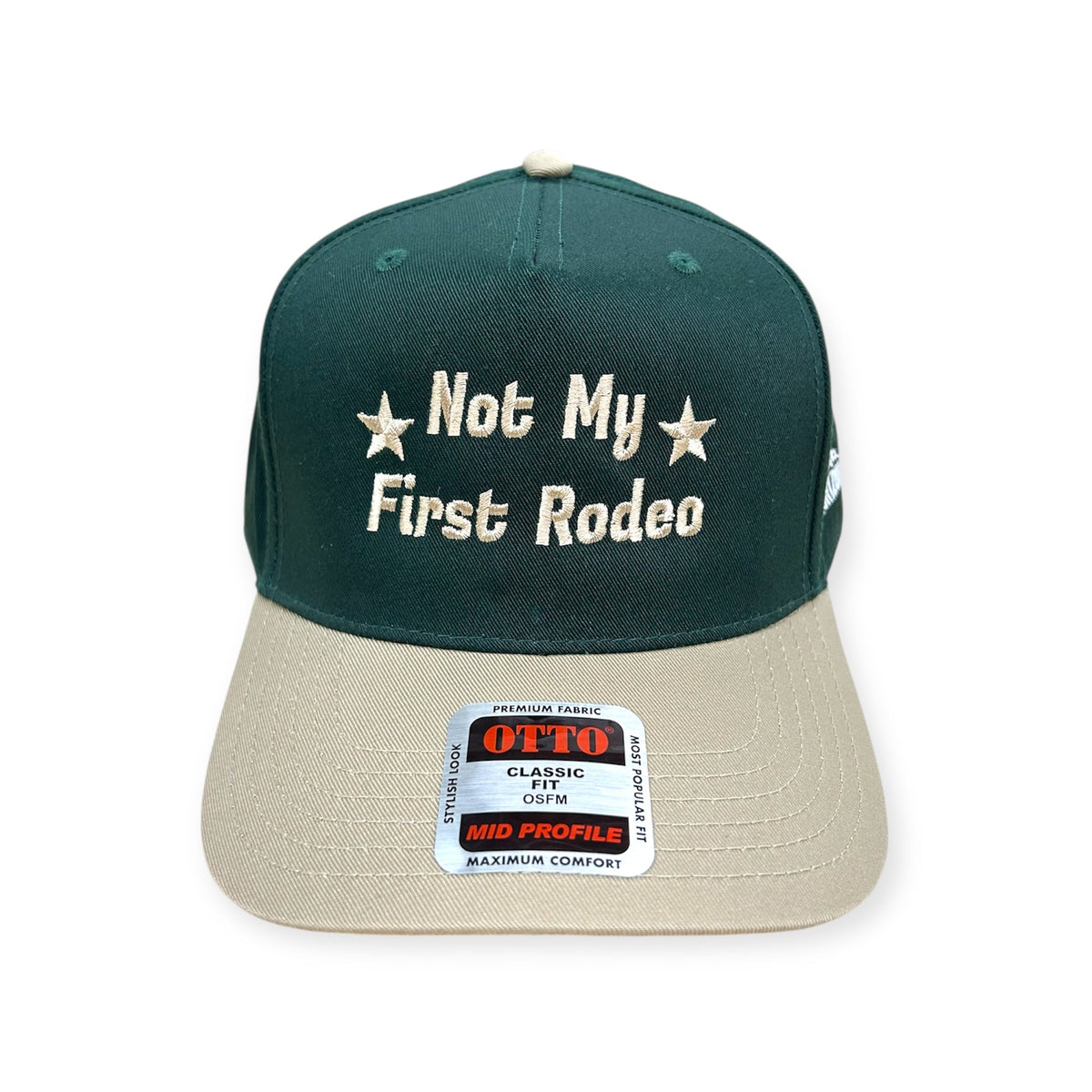 Front view of Not My First Rodeo embroidered cap by Horizon Hat Co. in green/natural showing not my first rodeo embroidery with stars