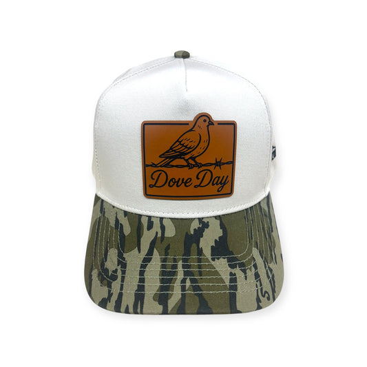 Front view of Dove Day patch hat by Horizon Hat Co. in white/camouflage bill showing dove perched on a fence on a front patch