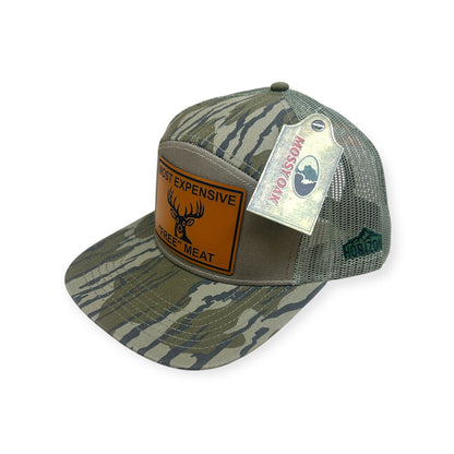 Angled view of Most Expensive Free Meat patch hat by Horizon Hat Co. in camouflage showing the bill and side panels