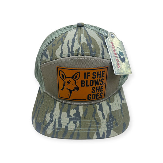 Front view of If She Blows, She Goes patch hat by Horizon Hat Co. in camouflage showing alert doe and hunting-humor lettering on a front patch