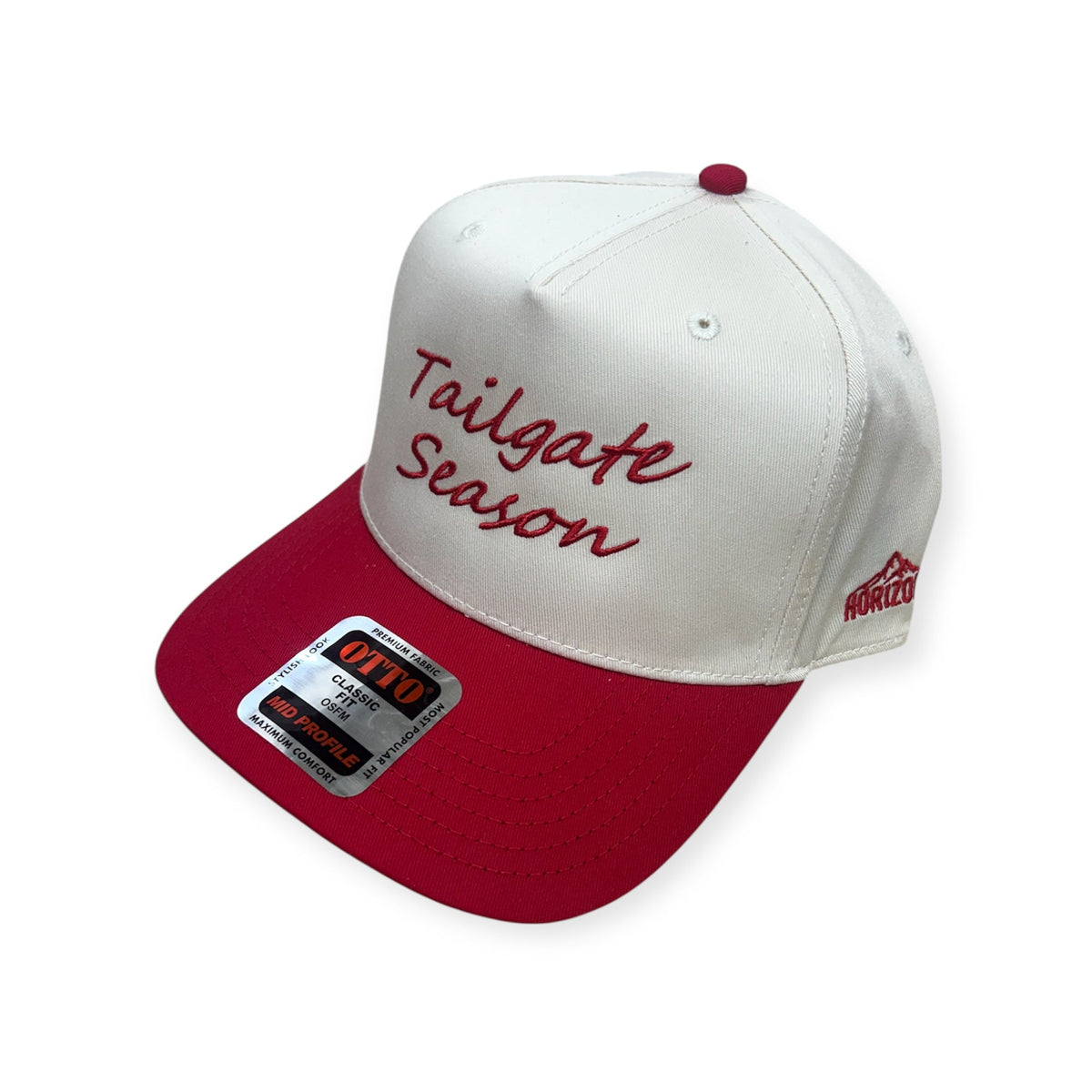 Angled view of Tailgate Season embroidered cap by Horizon Hat Co. in red/natural showing the bill and side panels