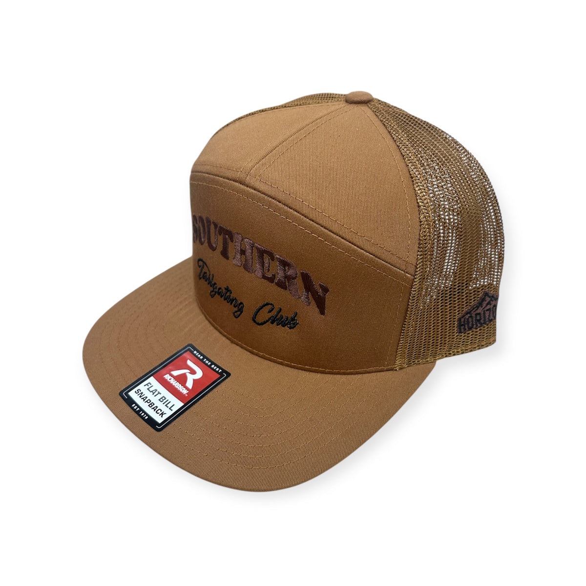 Angled view of Southern Tailgating Club embroidered cap by Horizon Hat Co. in caramel/brown showing the bill and side panels