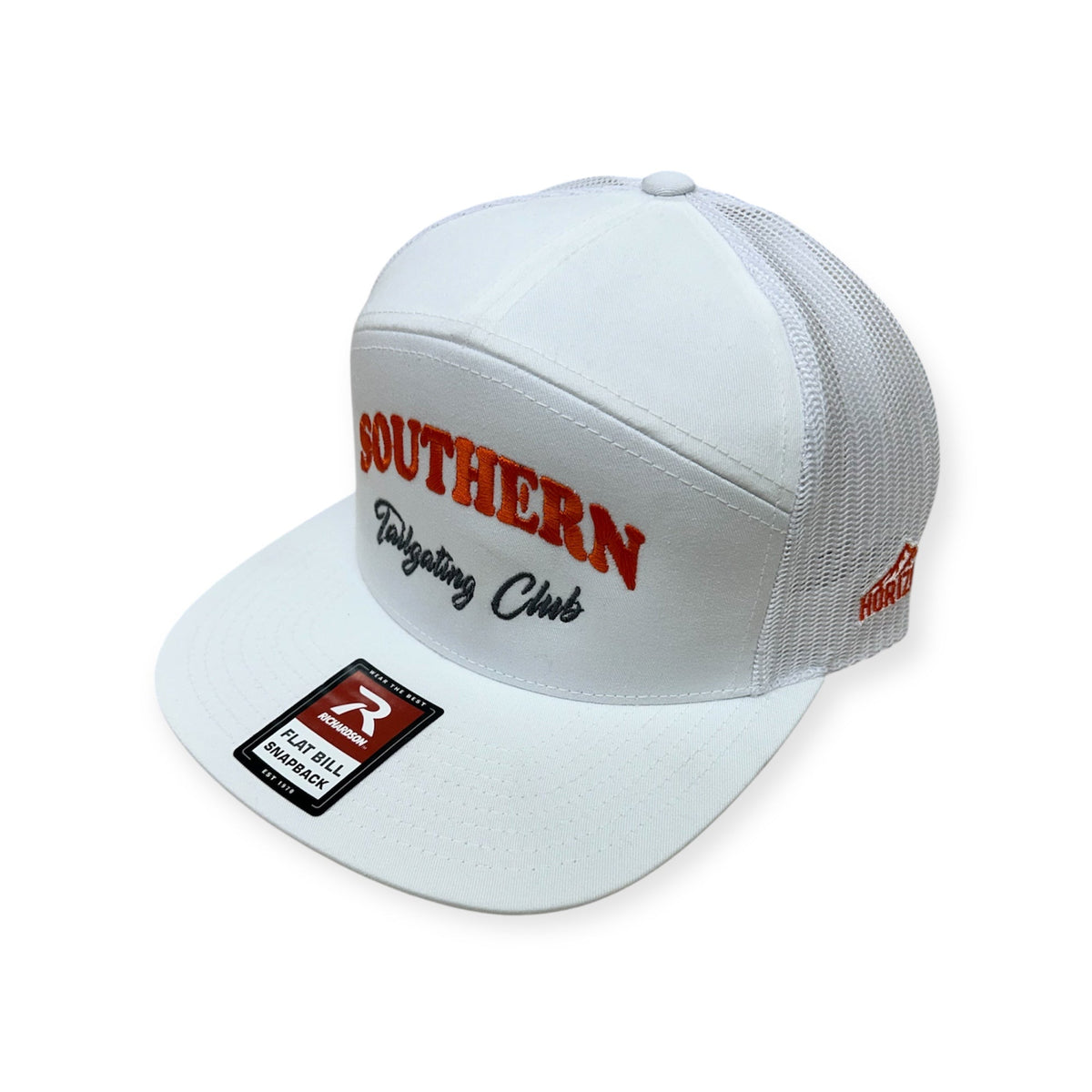 Angled view of Southern Tailgating Club embroidered cap by Horizon Hat Co. in white/orange showing the bill and side panels
