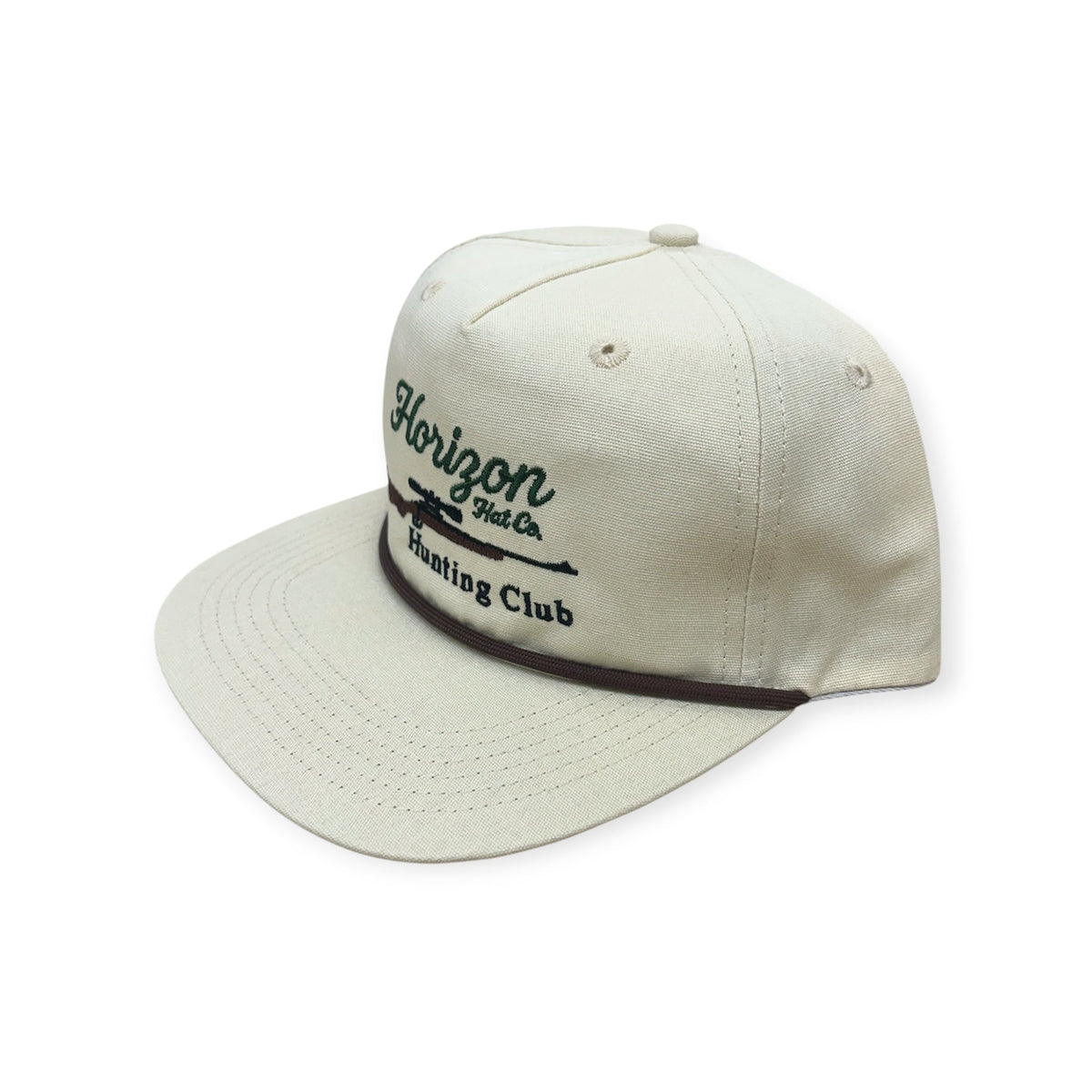 Angled view of Horizon Hunting Club embroidered cap by Horizon Hat Co. in cream showing the rope detail and side profile