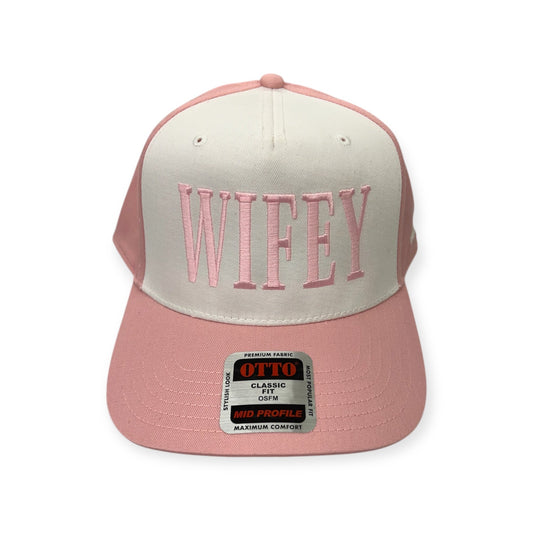 Front view of Wifey embroidered cap by Horizon Hat Co. in natural/pink showing large wifey front embroidery