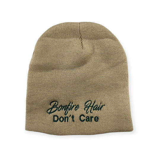 Bonfire Hair Don't Care knit beanie by Horizon Hat Co. in tan showing the stitched lettering