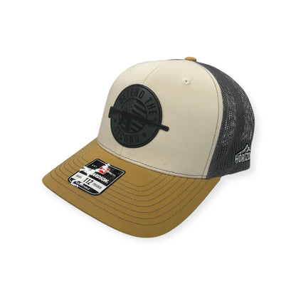Angled view of Defend the 2nd Flag patch hat by Horizon Hat Co. in mink/charcoal/amber showing the bill and side panels