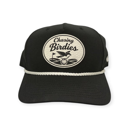 Front view of Chasing Birdies patch hat by Horizon Hat Co. in black/white showing birdie-themed golf patch with a golf-ball-textured surface