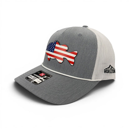 Angled view of the gray and white Freedom Bass cap showing the mesh back