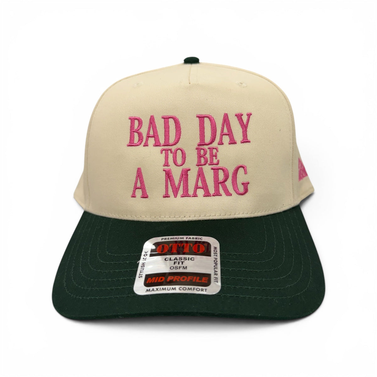 Front view of Bad Day to Be a Marg embroidered cap by Horizon Hat Co. in natural/green showing pink margarita-themed front embroidery