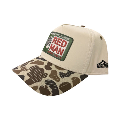 Angled view of RED MAN patch hat by Horizon Hat Co. in slough/natural baseball cap showing the bill and side panels