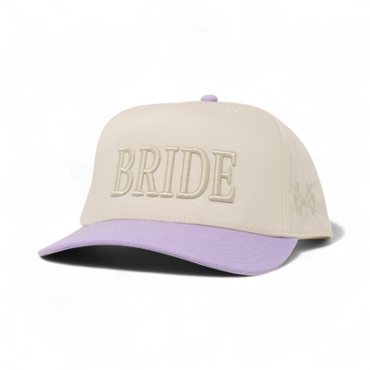 The Mad Hatter Company Bride Snapback Hat, natural crown with a lavender bill and Bride embroidery