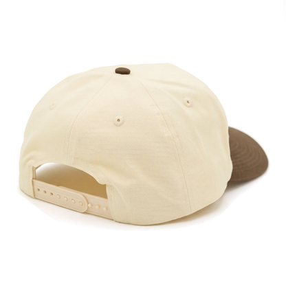 Rear view of the cream and brown Rattler Hat and adjustable closure