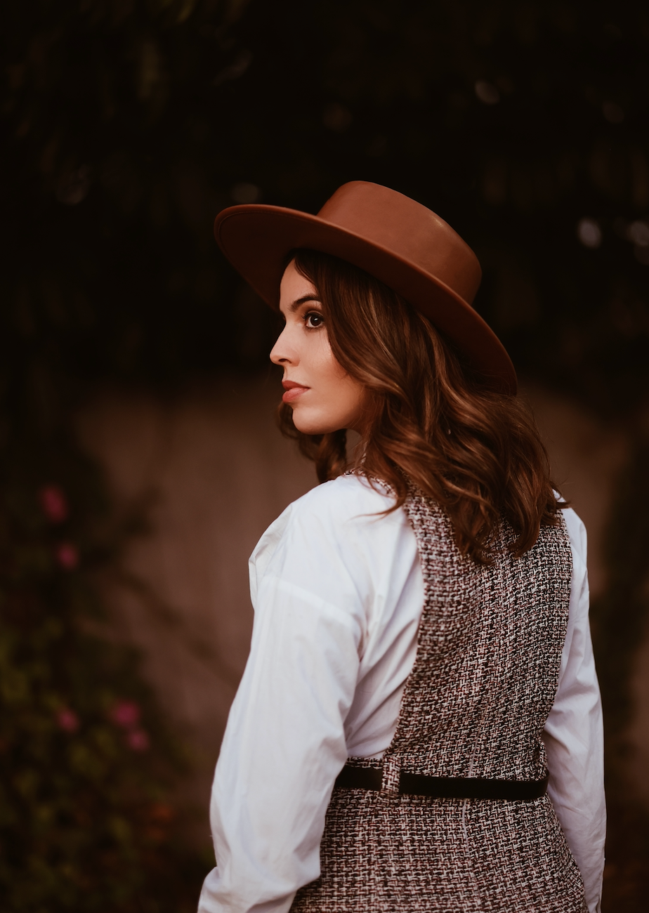 ASN Hats Tortoise - Tan tan brown boater hat, side view on a model with a light blouse