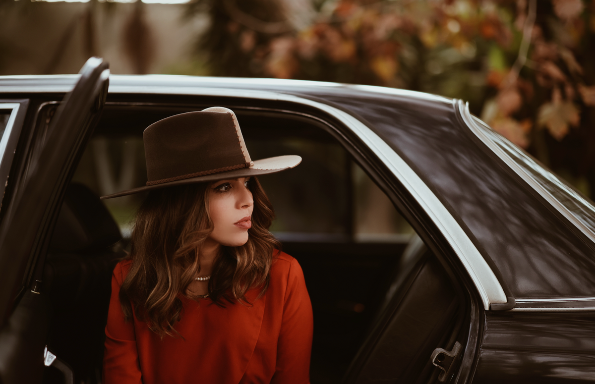 ASN Hats Cruel Intentions - Brown & Tan brown and tan fedora hat, worn at a car window