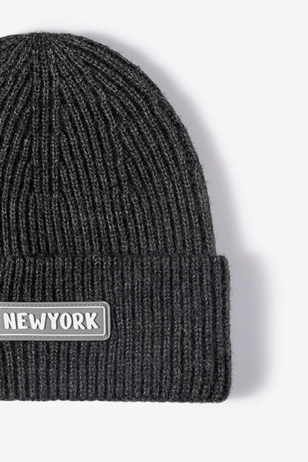 NEWYORK letter patch beanie close-up detail