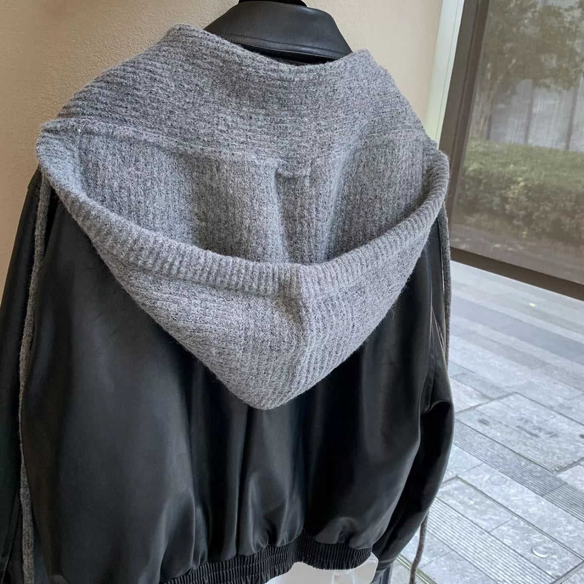Unisex Hooded Tie Knit Scarf — rear view of the gray knitted hood