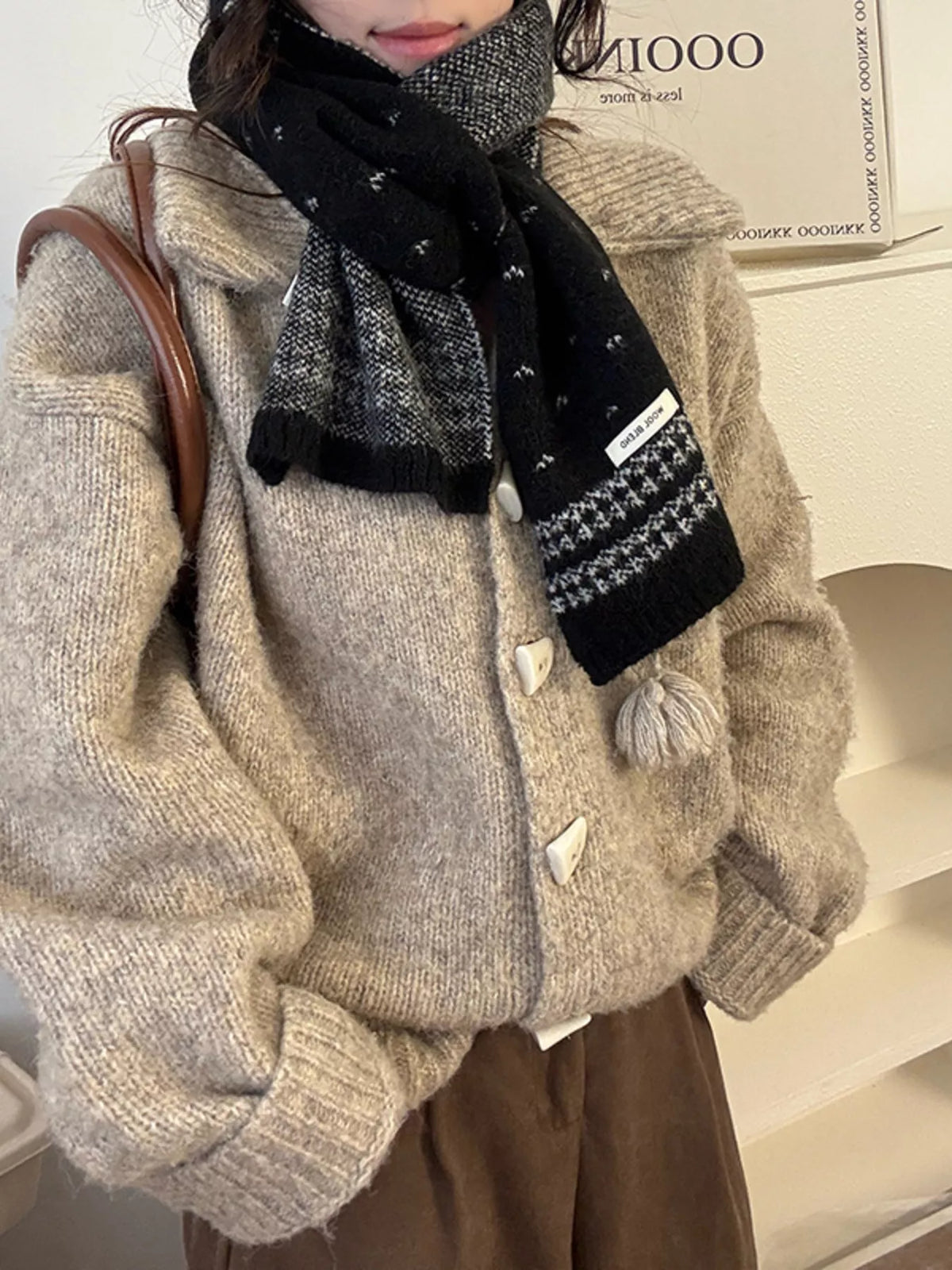 Unisex Flecked Border Knit Scarf — black knit scarf styled with a dark and light outfit