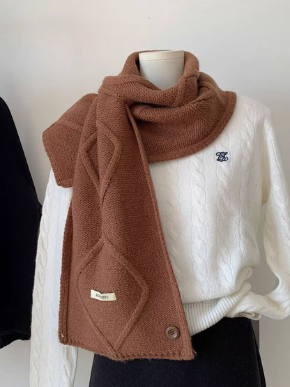 Unisex Solid Color Knitted Winter Scarf — brown winter scarf draped over light clothing