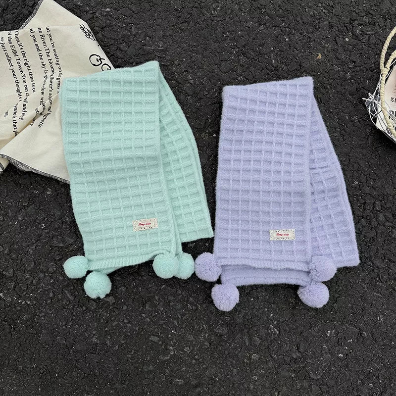 Unisex Waffle Knit Pom-Pom Scarf — folded mint and lavender waffle knit scarves