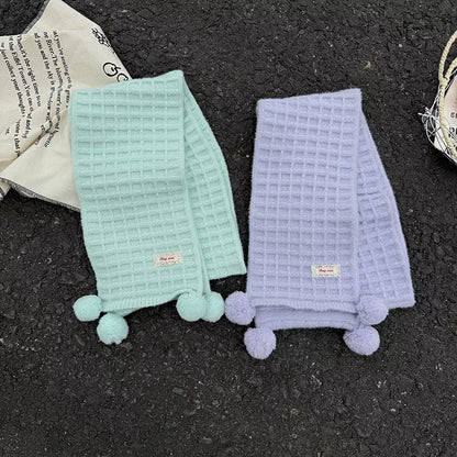 Unisex Waffle Knit Pom-Pom Scarf — folded mint and lavender waffle knit scarves