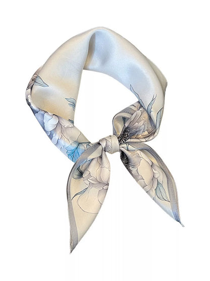 Unisex Floral Print Silk Square Scarf — isolated floral silk scarf arranged in a neck tie