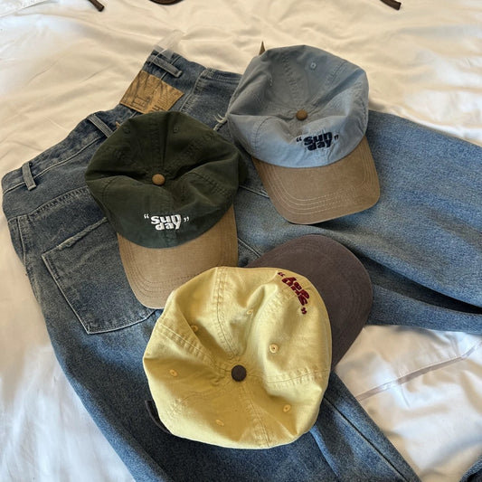 Four contrast-brim cotton baseball caps styled with denim