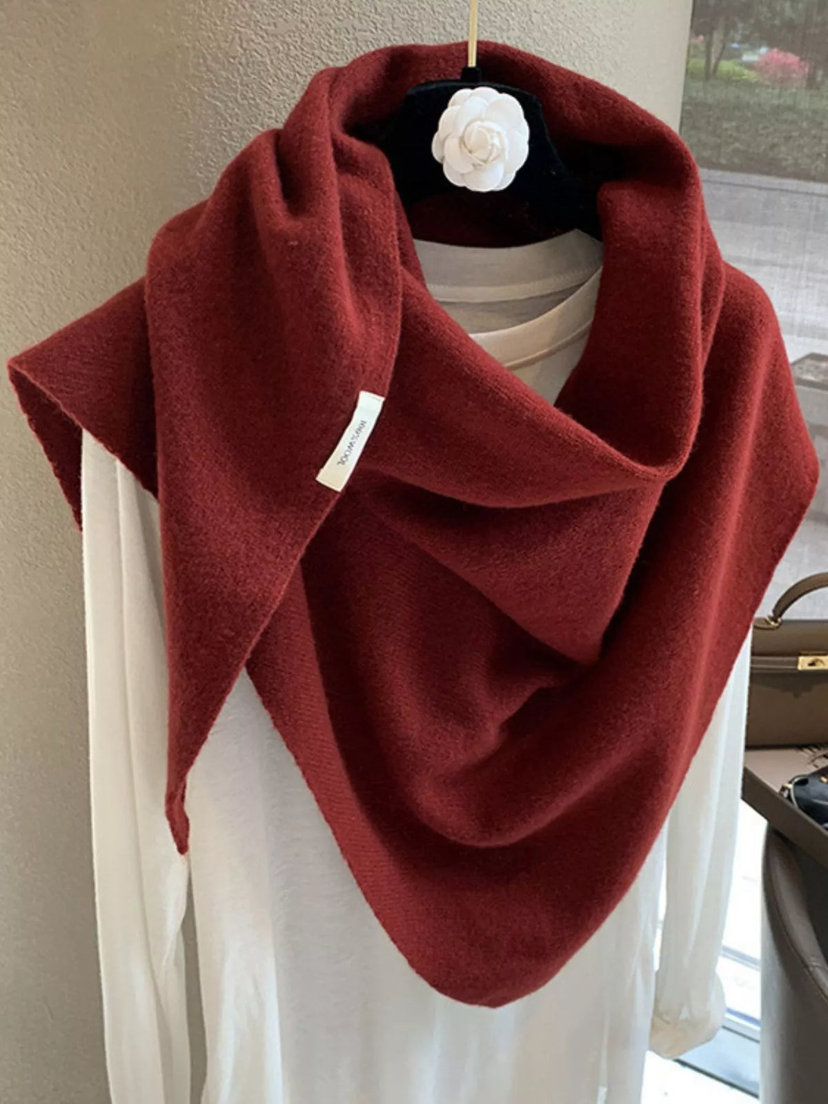 Women's Red Wool Triangle Shawl — close front view of a red pointed shoulder drape