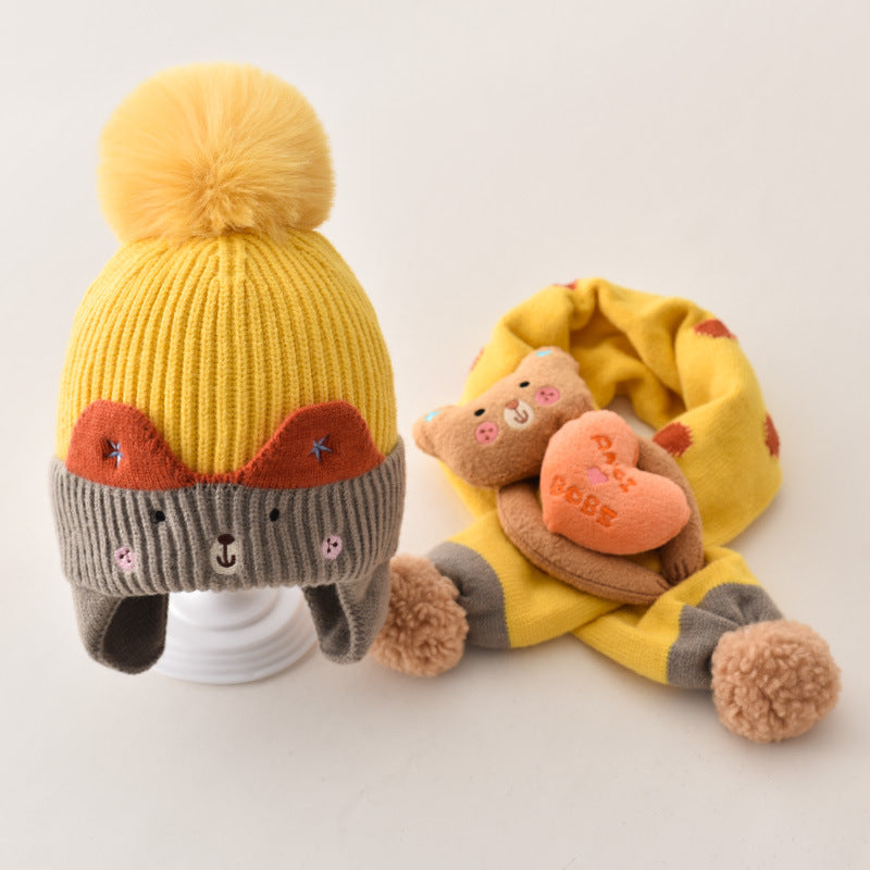 Yellow pom pom beanie with gray cuff and character scarf