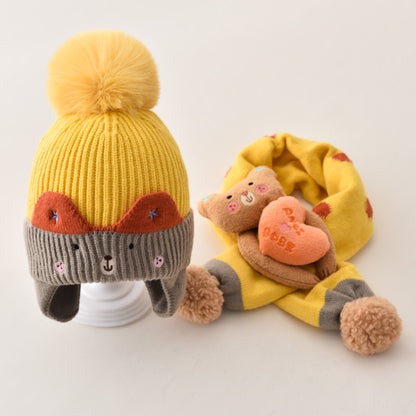 Yellow pom pom beanie with gray cuff and character scarf