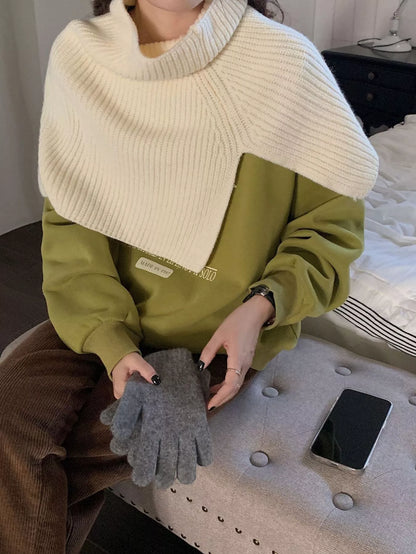 Women's Ribbed Knit Capelet — beige white capelet draped over a green sweater