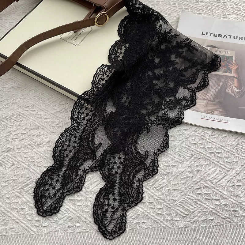 Women's Cotton Lace Neck Scarf — black floral scarf showing its shaped edge