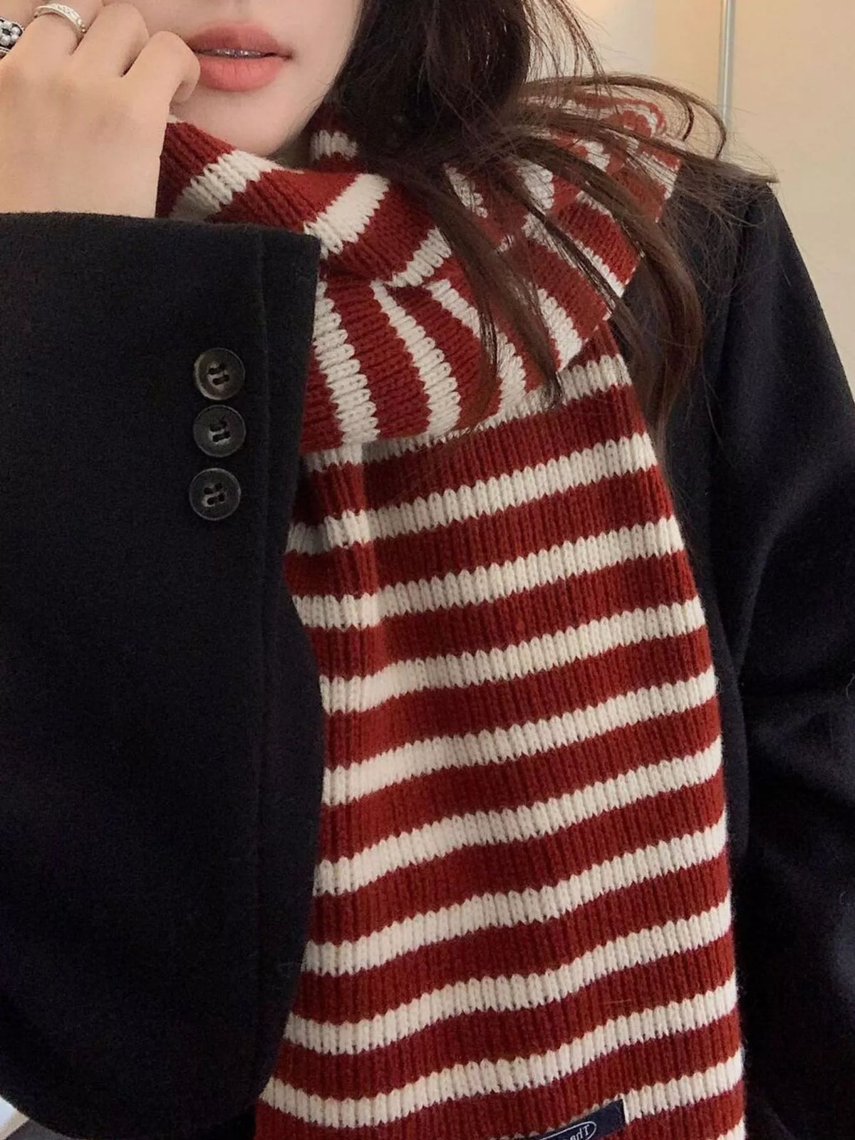 Unisex 100% Wool Striped Knitted Winter Scarf — close view of red and cream scarf at the neckline