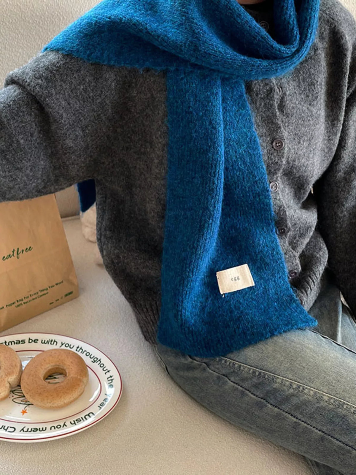 Unisex Fuzzy Solid Knit Scarf — peacock blue scarf worn around the neck