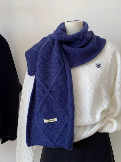 Unisex Solid Color Knitted Winter Scarf — navy scarf over a pale cable sweater