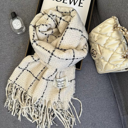 Unisex Fringe Plaid Scarf — cream windowpane scarf with long fringe beside a quilted bag