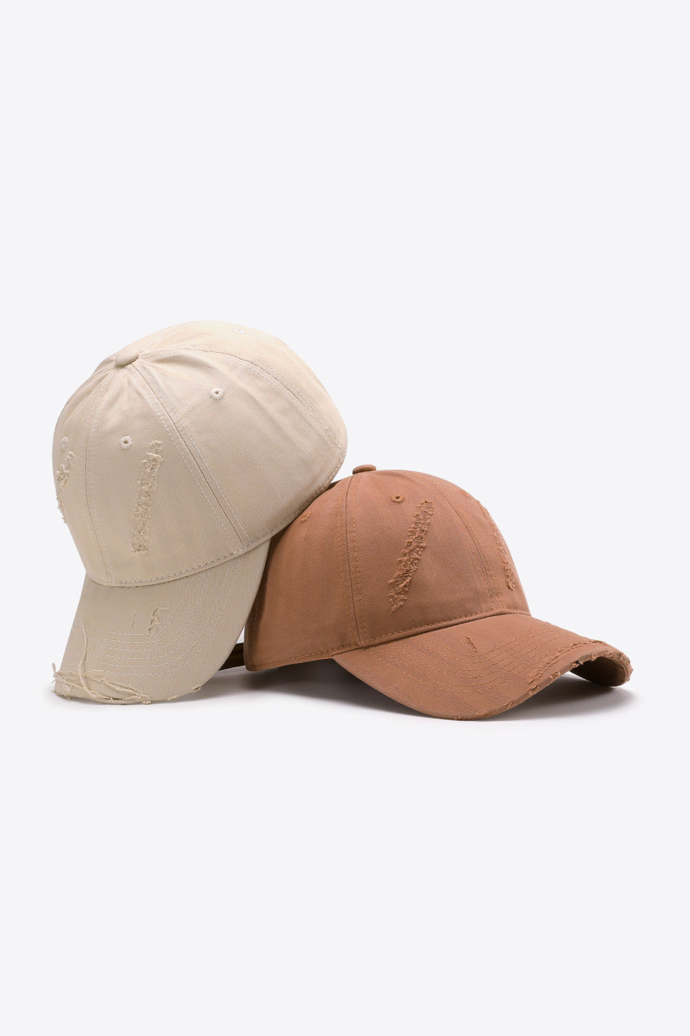Solid color distressed baseball cap flat lay