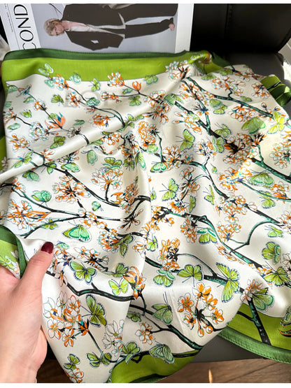 Unisex Floral Print Silk Scarf — close view of botanical print and green hem