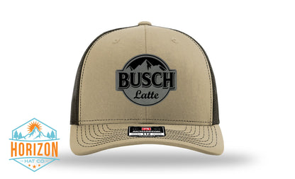 Front view of Busch Latte cap by Horizon Hat Co. in Khaki/Brown showing busch latte front patch