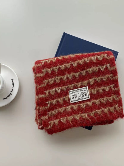 Unisex Vintage Knitted Pattern Scarf — folded orange red scarf showing repeating motifs