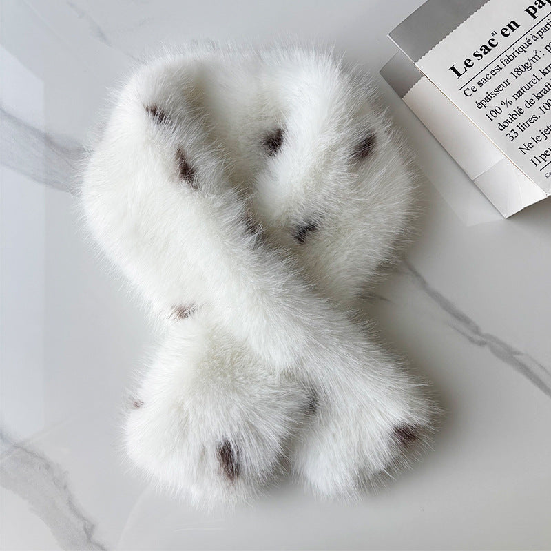 White spotted faux fur crisscross scarf displayed in a loop