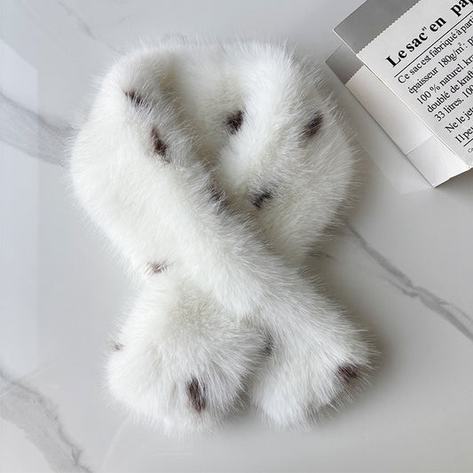 White spotted faux fur crisscross scarf displayed in a loop