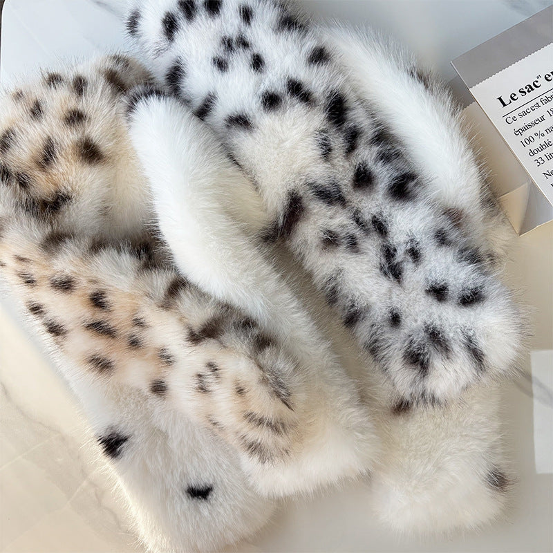 Close view of brown and black leopard print scarf textures