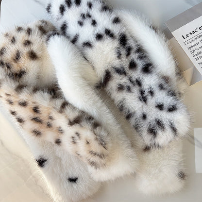 Close view of brown and black leopard print scarf textures