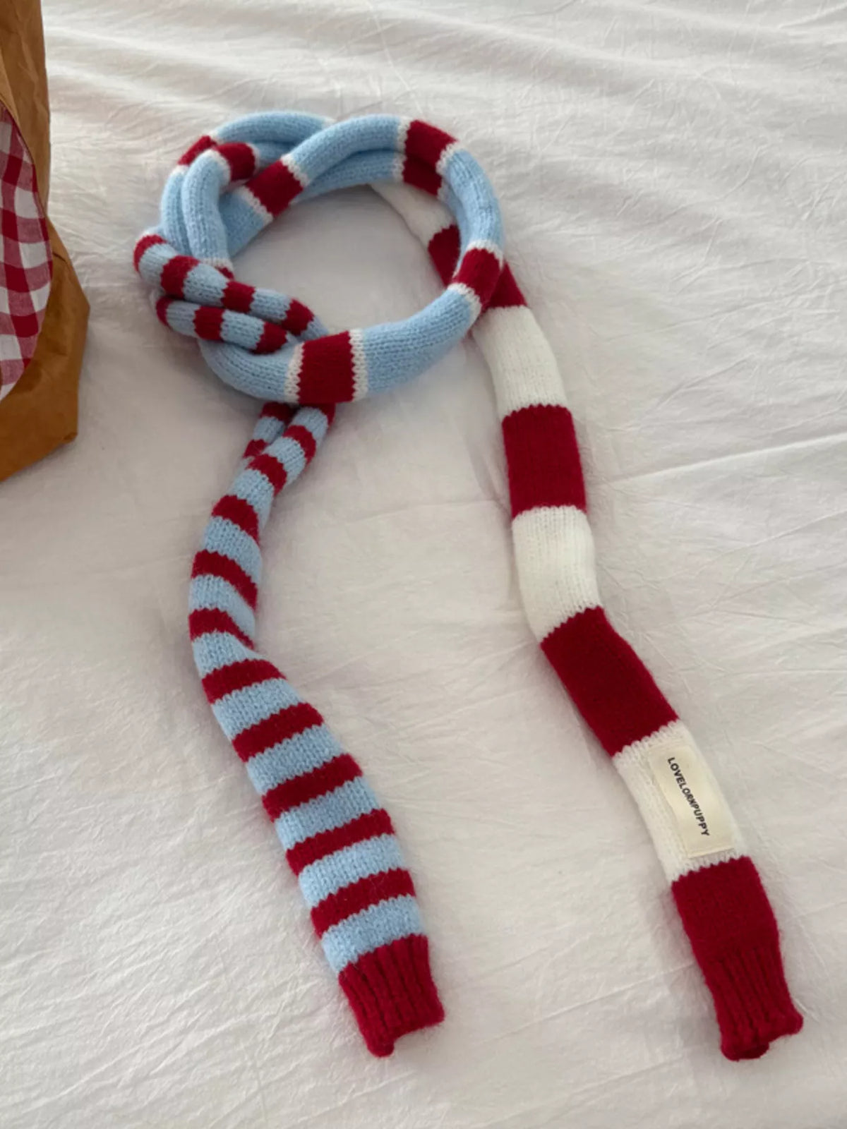 Unisex Red Stripe Skinny Scarf — multitone skinny scarf arranged in a circle